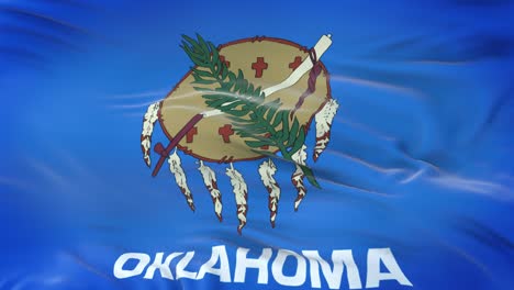 bandera de oklahoma (estado de los estados unidos) ondeando en el viento con una textura de tela muy detallada. bucle sin costuras