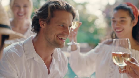 attractive man dancing with friends at summer dance party drinking wine enjoying summertime social gathering having fun celebrating on sunny day 4k footage