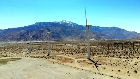 windmills, wind turbines- aerial 4k drone push, fly-in, energy green, renewable, power generating farm, mt