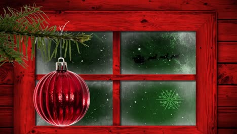 Animation-of-snow-falling-over-christmas-decoration-and-window