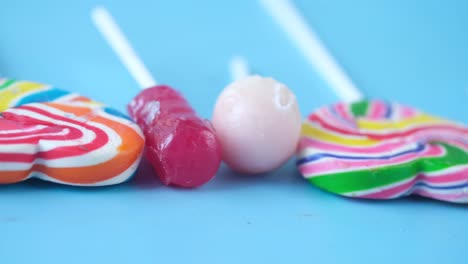 colorful lollipops on a blue background