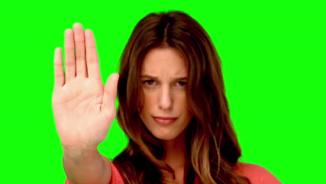 woman showing the stop sign with her hand