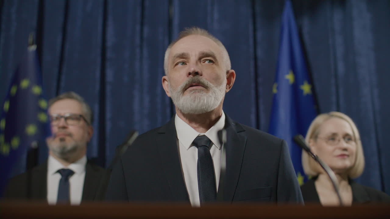 Senior Politician Delivering Speech at European Union Press Briefing