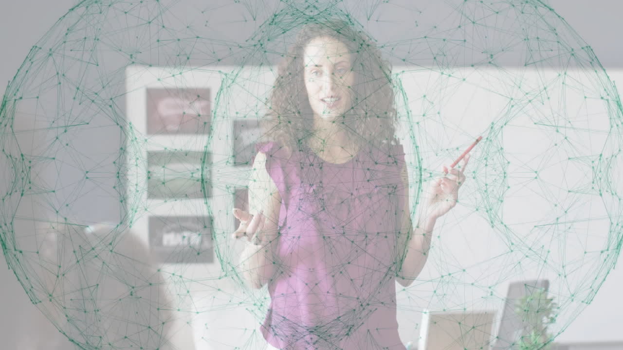 Woman holding pen with network connections animation over office background