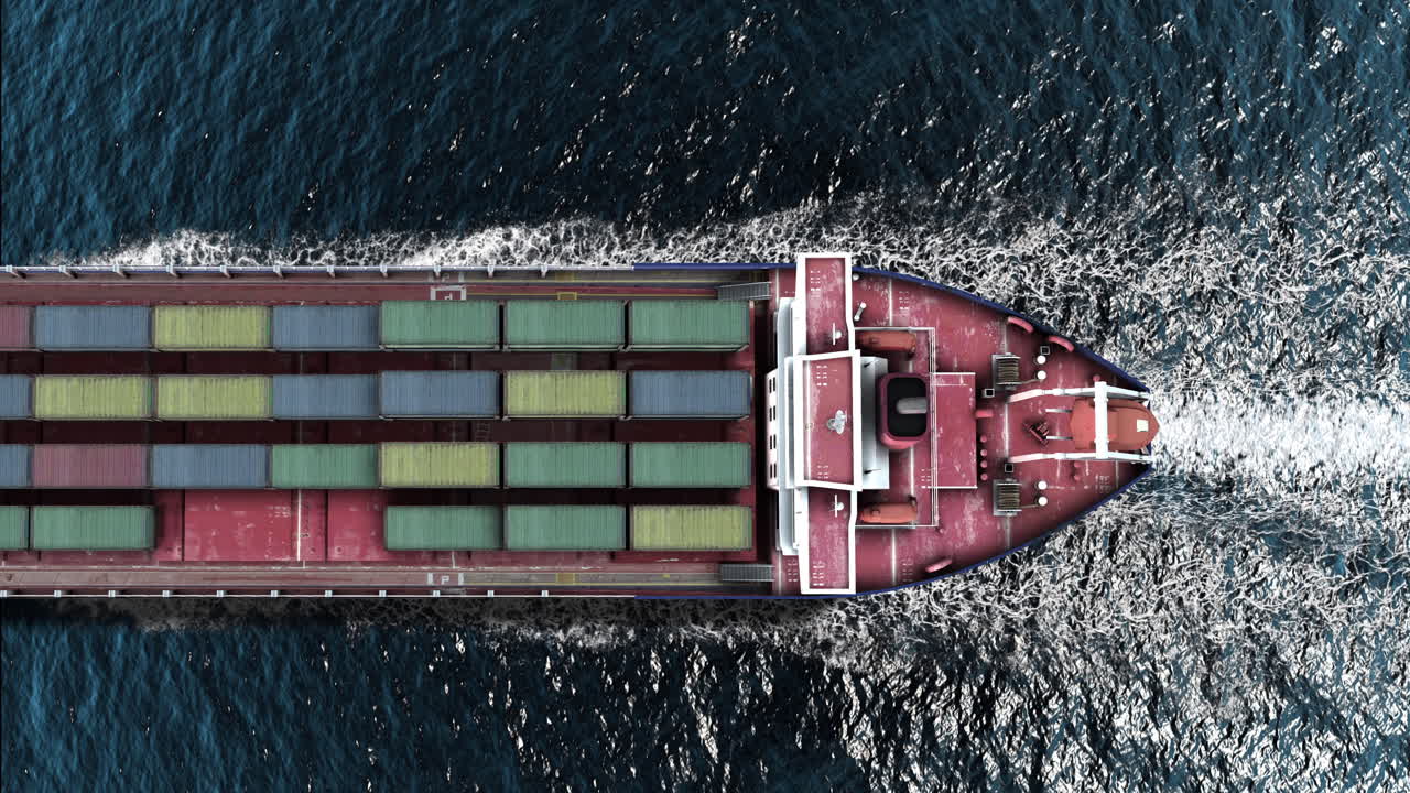 Aerial top view of a cargo ship with containers sailing on the ocean