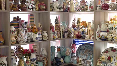 handmade traditional ceramic artefacts and souvenir at small shop, agiasos village, mytilene, lesvos, gimbal shot