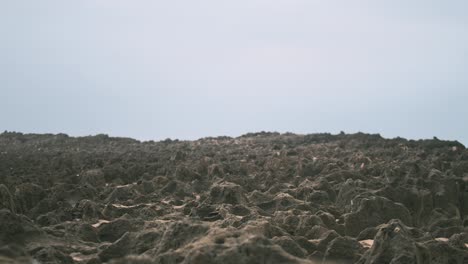 Eroded-rock-formation-along-the-coastline-of-Milfontes-seaside-Wide-Shot