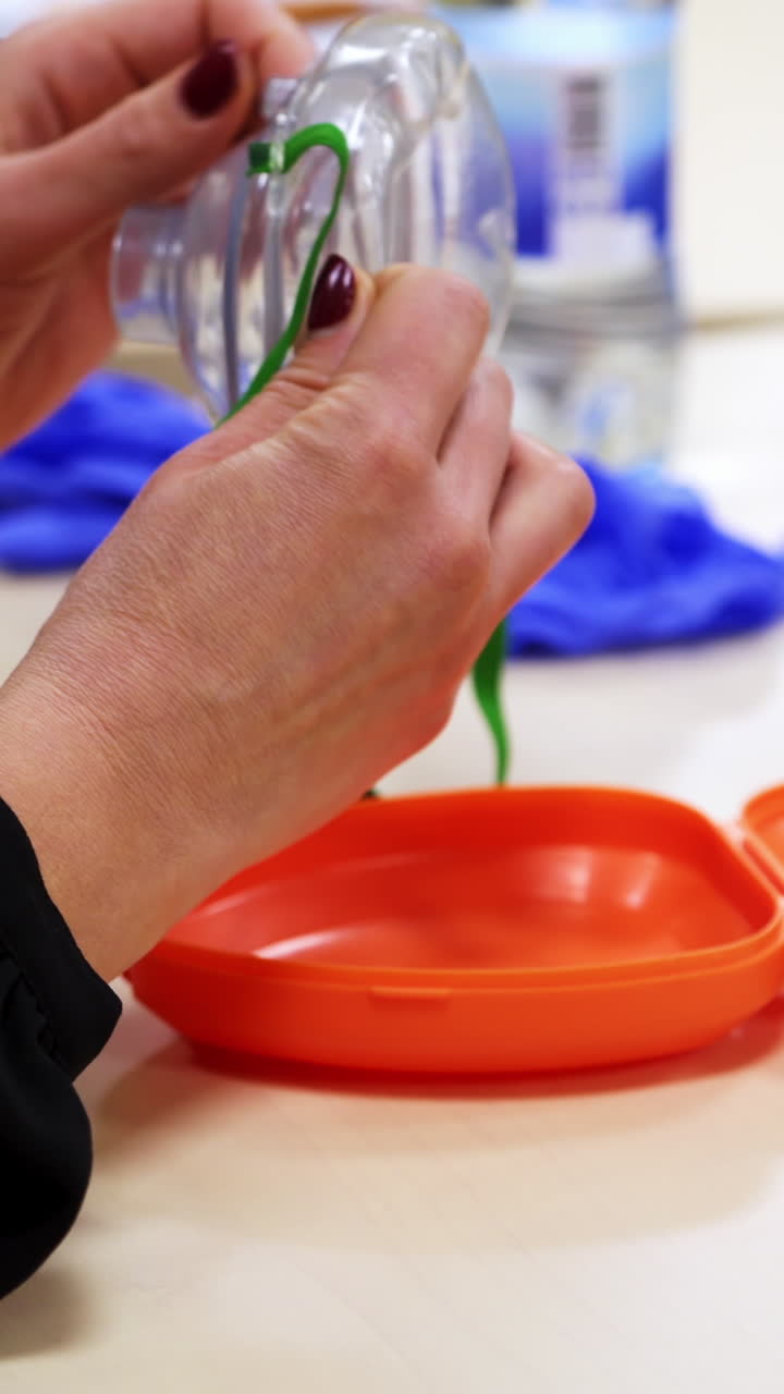 Closeup details of oxigen mask for training or practicing techniques. Healthcare and education video Vertical video