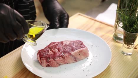 preparing a rib eye steak