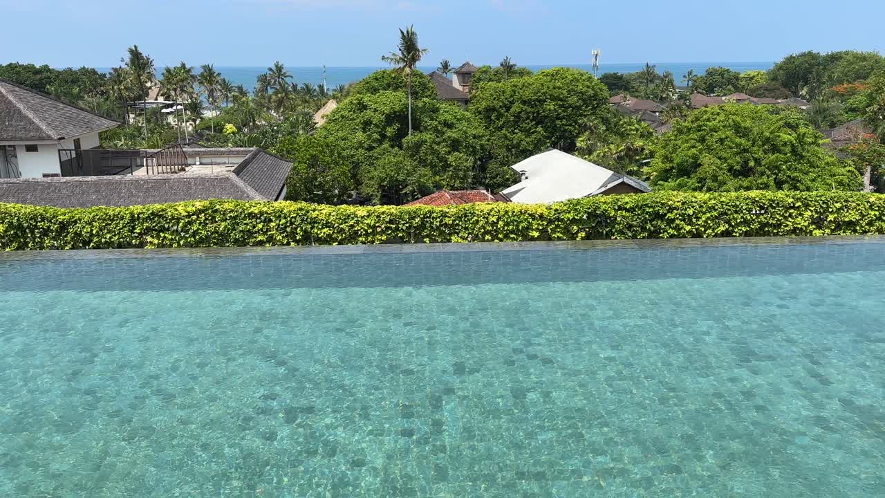 Bali hotel infinity pool in Legian looking out to the ocean
