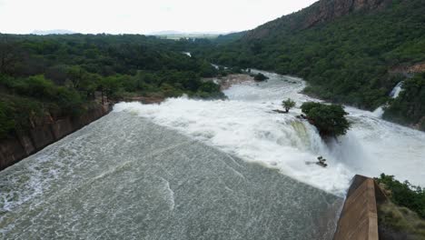 dam release water reaching end of spillway tumbles over waterfall