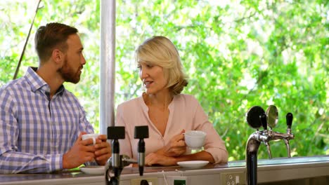 Couple-interacting-while-having-coffee