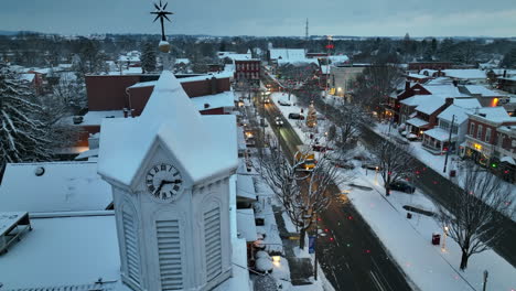 clock tower and steeple in winter snow