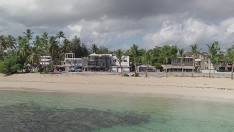 Aerial-Slide-of-Las-Terrenas-Seaside-Road-and-Beach,-Dominican-Republic