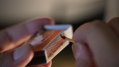 lighting a match: a close-up