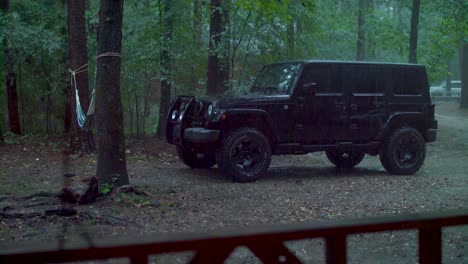 jeep in driveway on rainy day