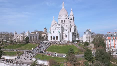 crowd of people at basilica of sacre coeur, montmartre hill in paris, france