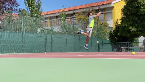 tennis player practicing backhand movement and volley in the air