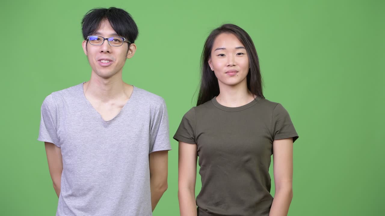 Young Asian couple talking together