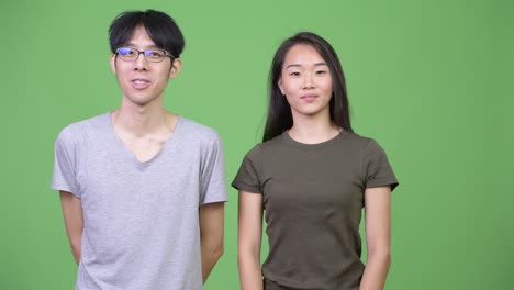 young asian couple talking together