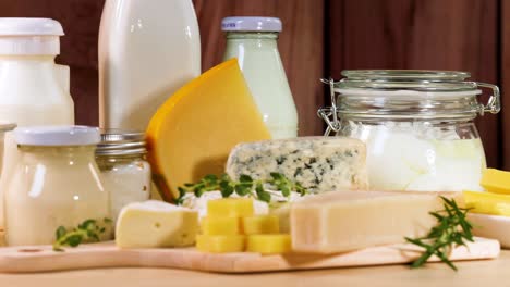 assorted dairy items displayed on wooden surface