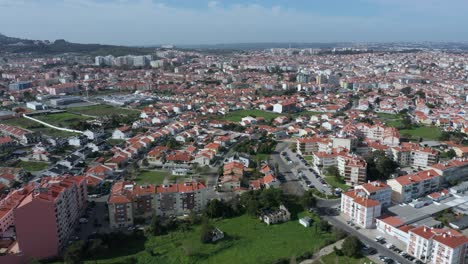 super wide aerial view of typical portugese houses - suburban lisbon neighborhood