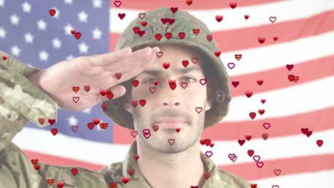 animation of hearts over caucasian male soldier and flag of usa