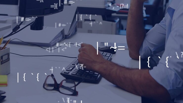Male tech worker holding phone, receiving notification, replying, typing on keys under code overlay