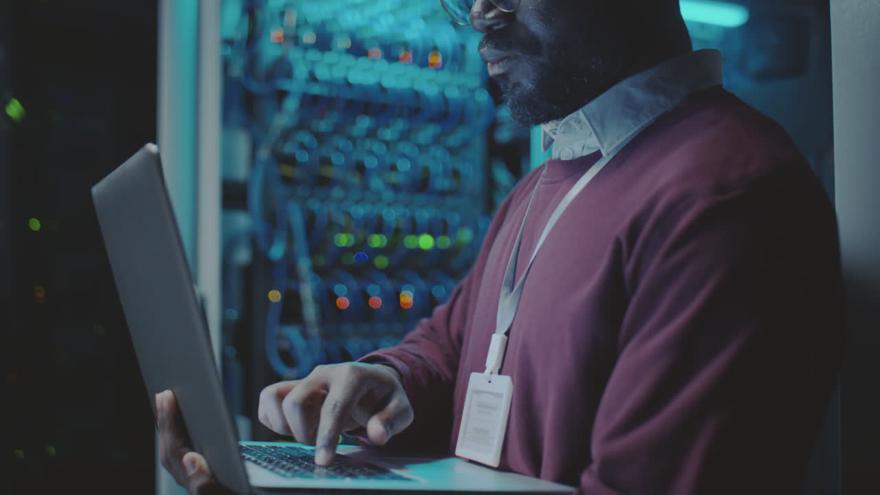 IT Professional Working in a Server Room