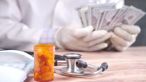 doctor with money and pills