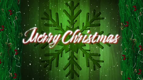 animación de texto de feliz navidad sobre la nieve que cae en el fondo verde de navidad