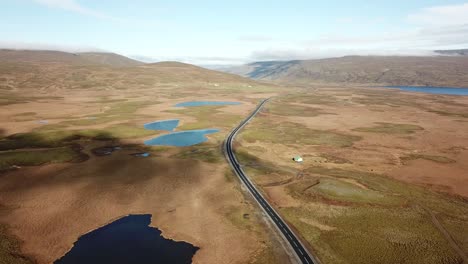Vast open nature of western Iceland along a desolate road