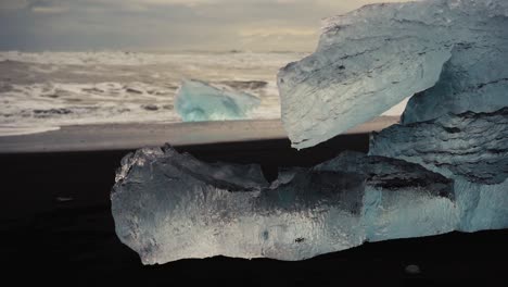 slow motion shots of blue icebergs on diamond beach in iceland