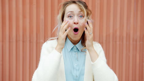 woman expressing surprise and joy
