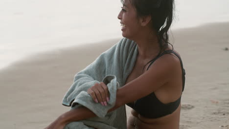 Woman-drying-herself-with-towel