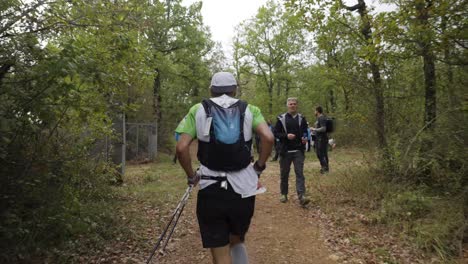 Templars-Trail-Participant-running-Among-Spectators,-Millau,-France