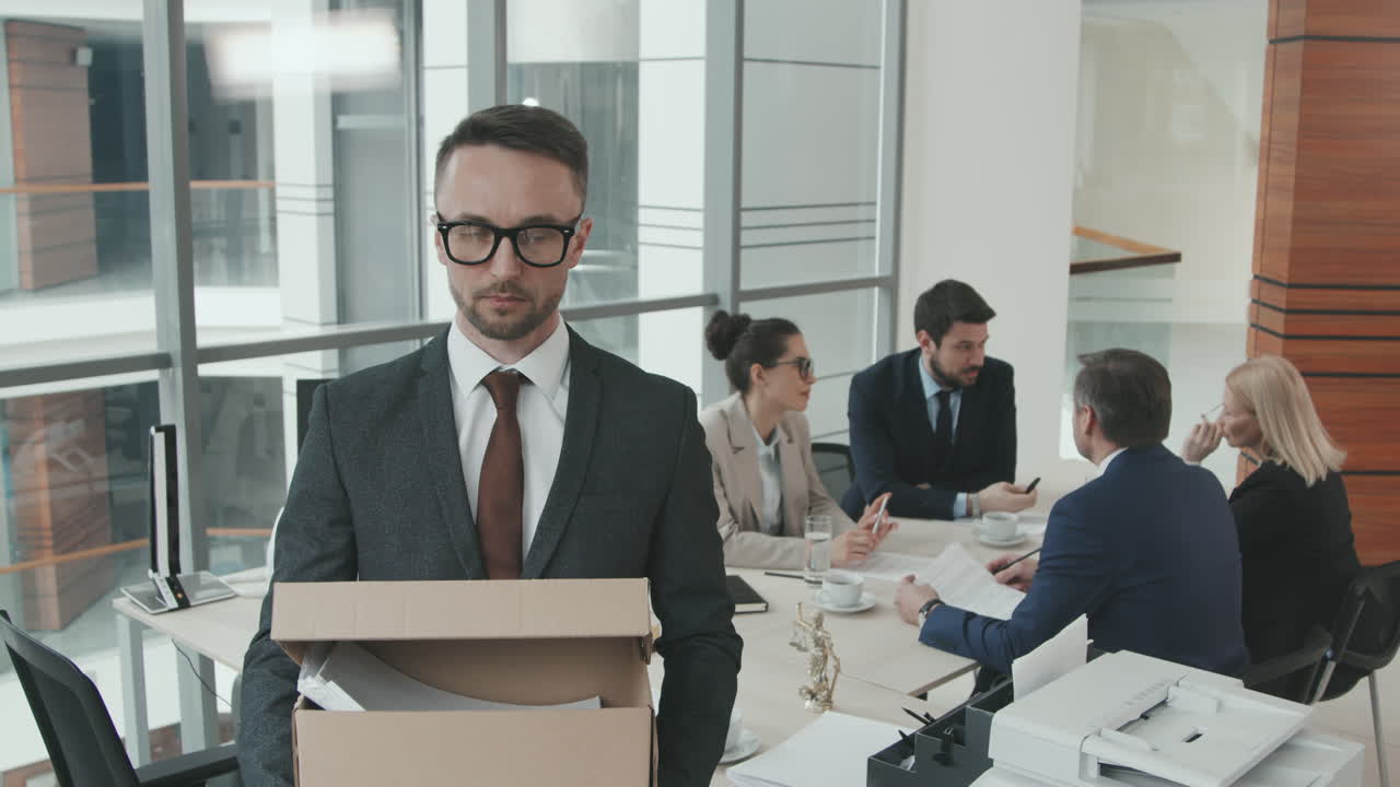 Portrait of Lawyer with Box of Legal Documents