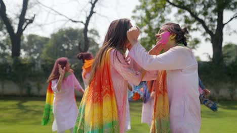 Indian-couple-dancing-at-a-Holi-party