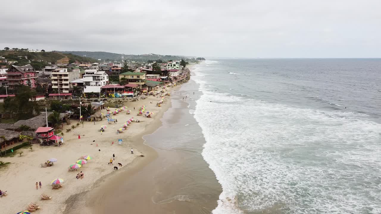 Aerial pass by of Montanita Ecuador. Ecuador beach town reveal pacific coast on the ruta del spondylus