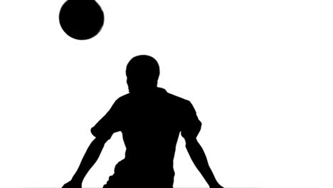 Silhouette-Eines-Fußballspielers,-Der-Den-Ball-Anführt