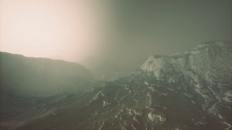 stunning ethereal landscape with misty mountains at dawns first light