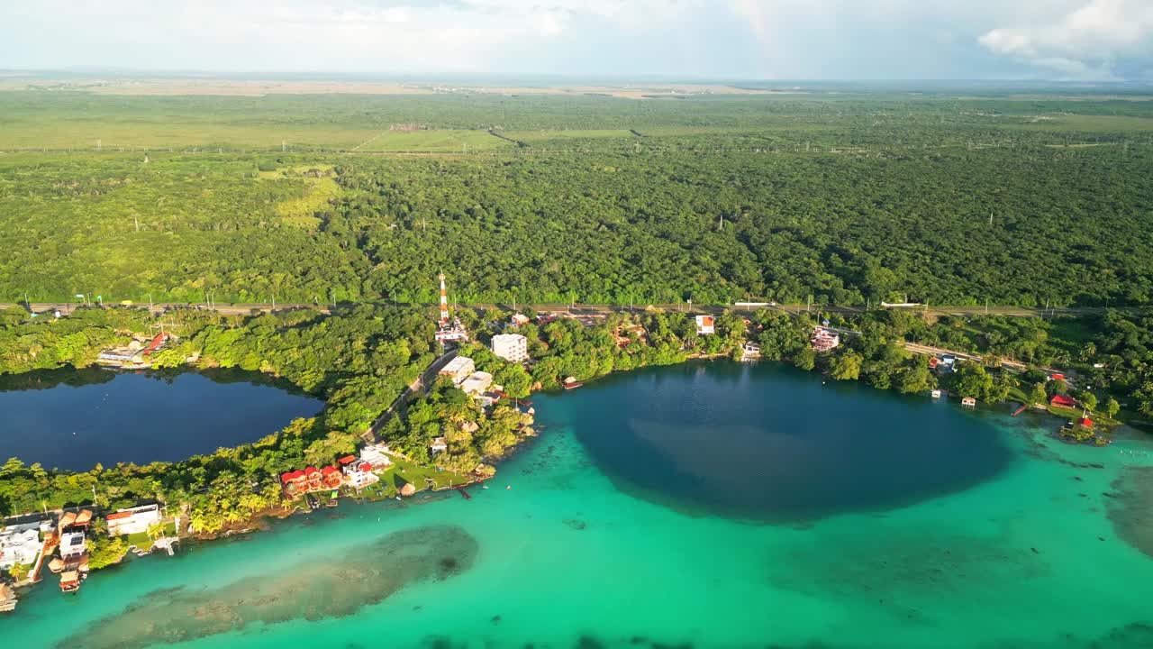 Aerial view of Bacalar lagoon, Mexico, vibrant turquoise waters, lush greenery