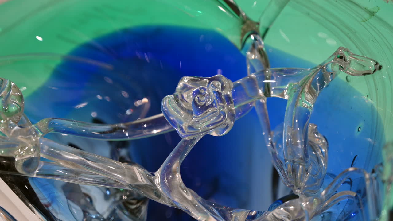 Blue green glass crystal vase close up