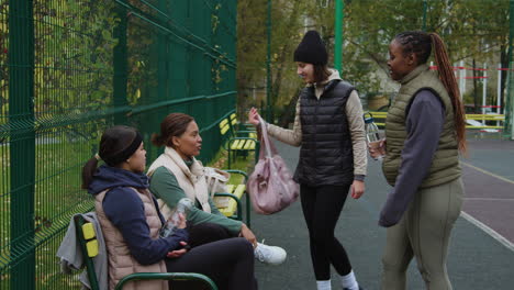 friends in an outdoors soccer field