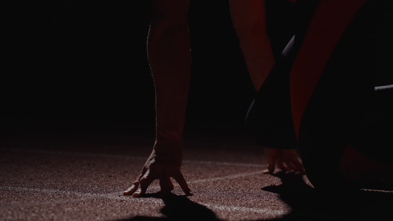 velocista en la línea de salida