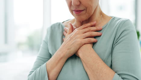 Closeup,-senior-woman-or-chest-pain-with-hands