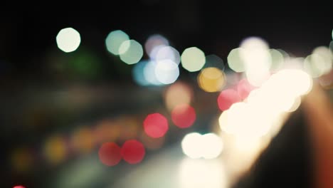 tráfico de bokeh nocturno abstracto, una celebración de la colección del festival