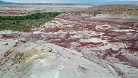 aerial view of amazing utah desert landscape, layered sandstone formations amd hills near hanksville