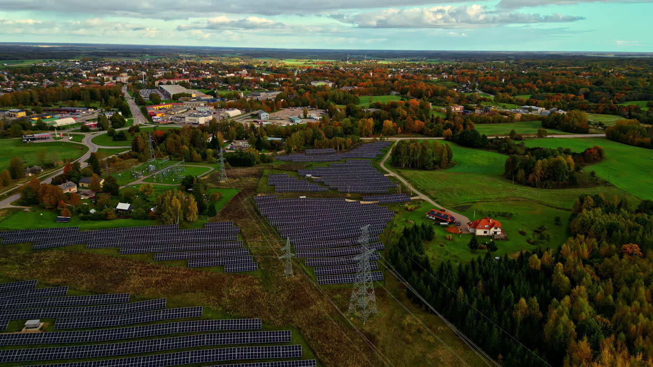 Aerial View of a Solar Farm in a Rural Autumn Landscape
