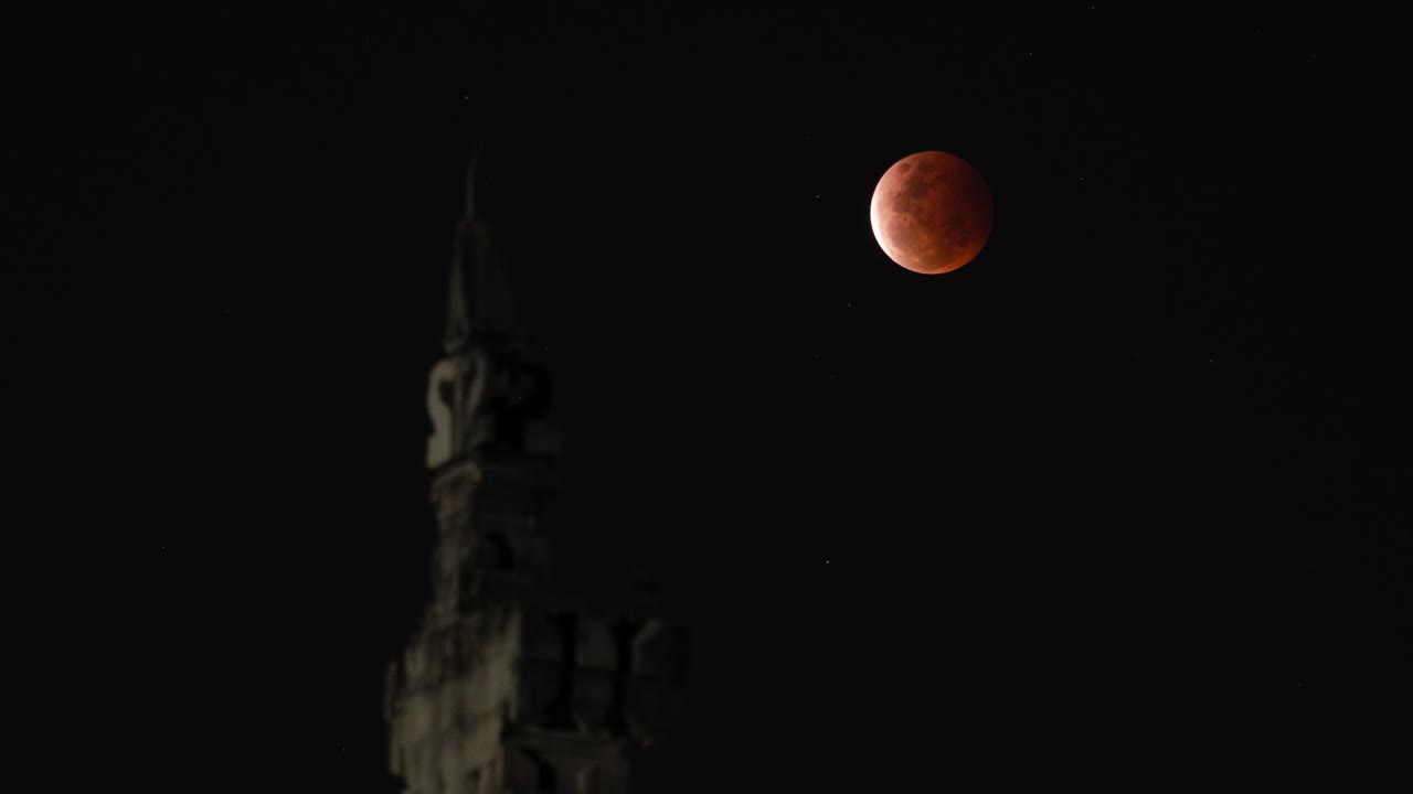 Blood Moon over a Tower